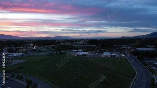 Aerial drone shot of Logan Utah, home of Utah State University, at sunset photo