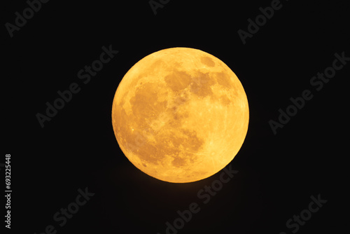 Obraz na płótnie Super strawberry moon, reddish full moon on a summer night. w salonie