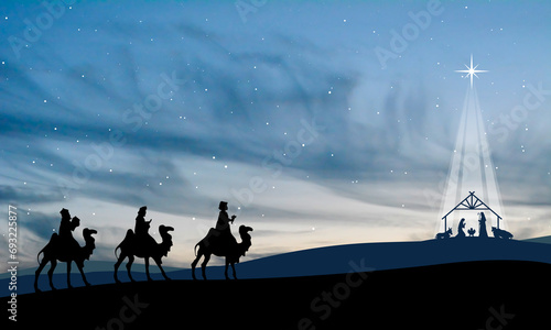 Christmas Nativity Scene - Three Wise Mens go to the stable in the desert photo