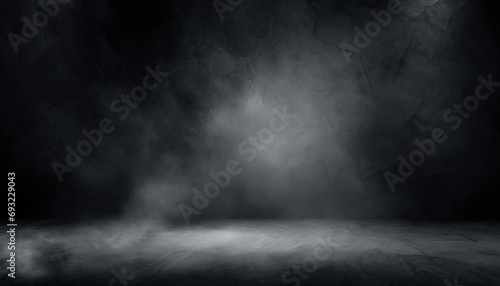 Empty dark abstract space with a textured cement wall. photo