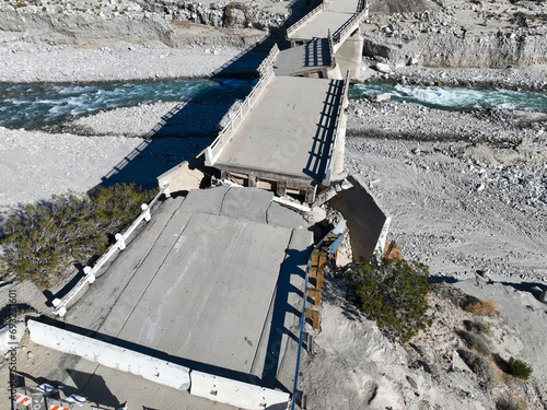 Canvas-taulu A Bridge that Collapsed due to a Tropical Storm and Run Off with Erosion over a