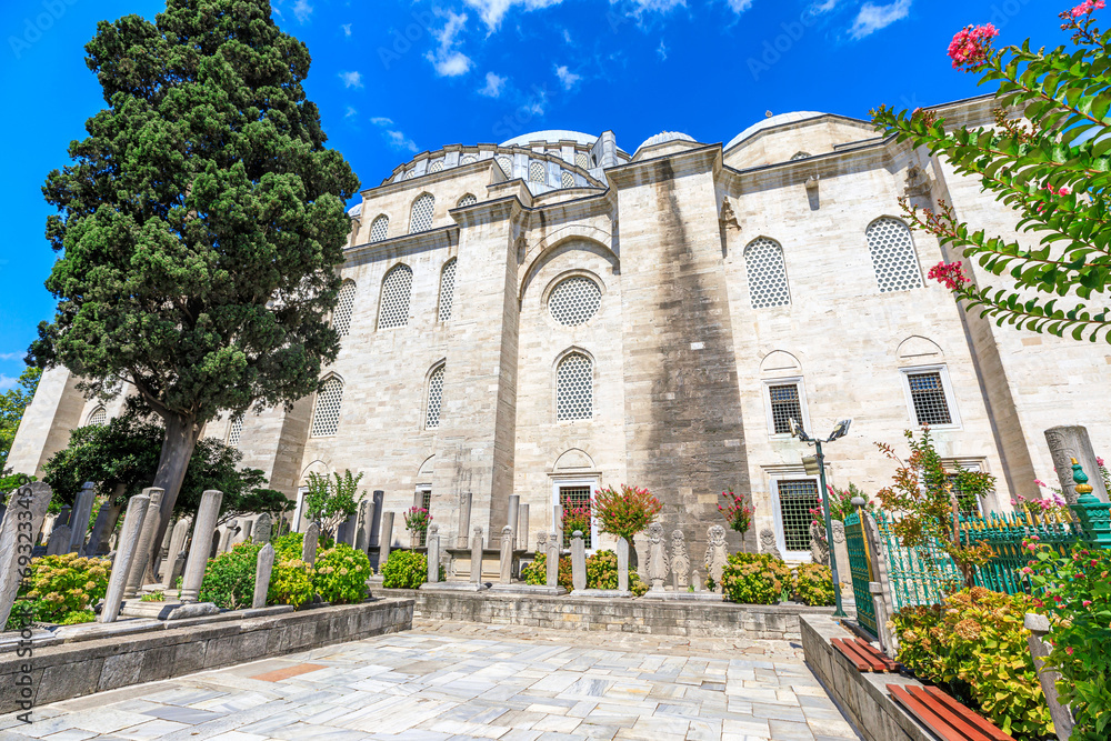 Suleymaniye Mosque's courtyard stands as an architectural marvel, a testament to the splendor of the Ottoman Empire in Istanbul, Turkey. It is a testament to the vision of Sultan Suleyman.