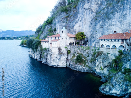 Drone view at the monastery of Santa Caterina del Sasso on lake Maggiore Italy