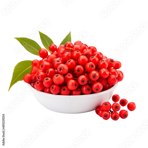 fresh organic mountain ash berry cut in half sliced with leaves isolated on white background with clipping path photo