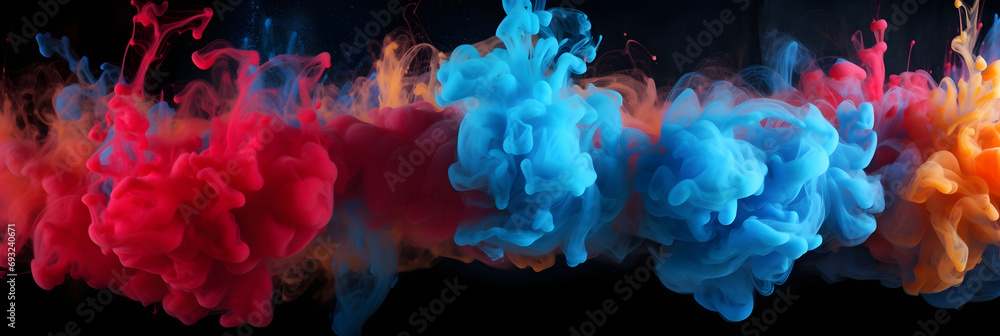 Acrylic blue and red colors in water. Ink blot. Abstract black background. Acrylic blue and red colors in water. Ink blot. Abstract black background.