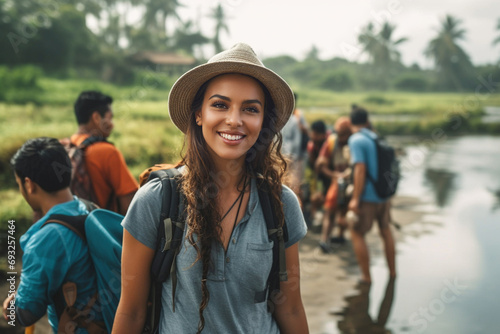 young adult woman traveling...
