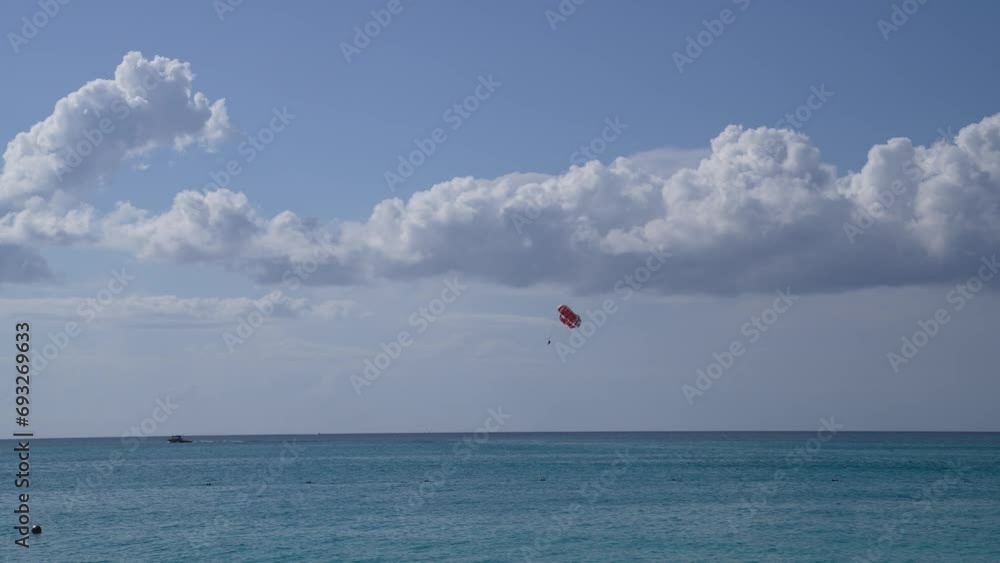 Parasailing with boat above blue ocean 4K Parasailing with boat above blue ocean 4K