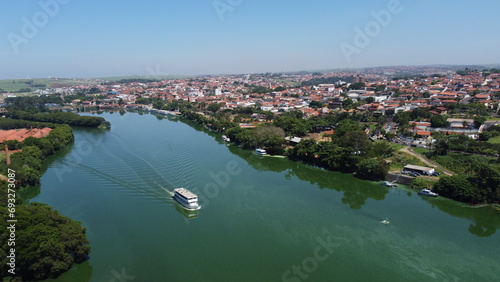 Barco no rio tietê em barra bonita-sp photo