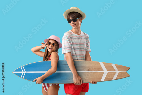 Cute children with surfboar...