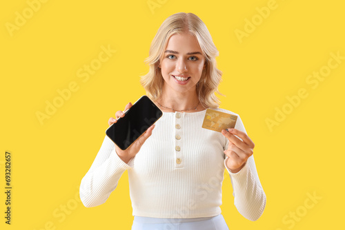 Young woman with credit car...