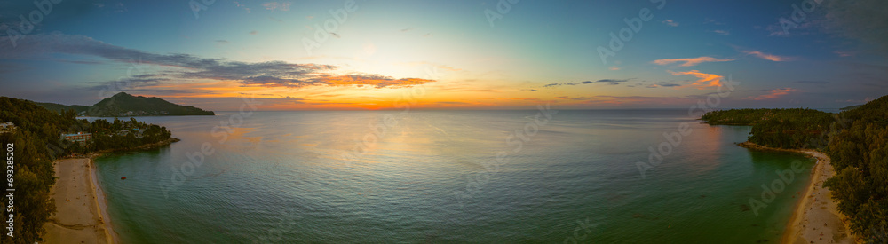 .aerial panorama beautiful sunset at Surin beach Phuket..amazing colorful cloud in beautiful sky at sunset..Scene of Colorful romantic sky sunset with cloud in the sky background.. .aerial panorama beautiful sunset at Surin beach Phuket..amazing colorful cloud in beautiful sky at sunset..Scene of Colorful romantic sky sunset with cloud in the sky background..