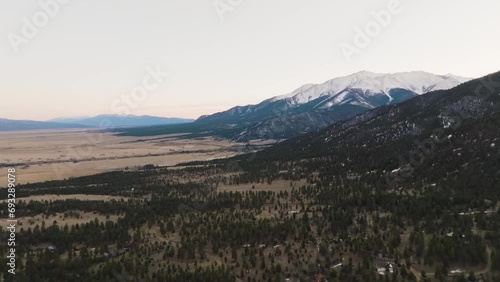 Drone over pine trees and alpine climate approaching Mount Princeton in the Rocky Mountains in Colorado photo