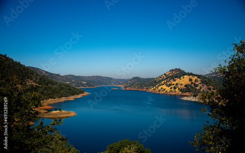 Lake Don Pedro and surrounding mountains with trees
