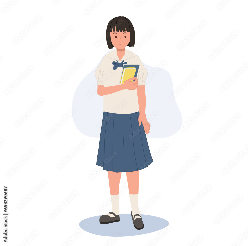 Learning and Knowledge Concept. Happy Thai Student in Uniform with Books Signifying Intelligence. Learning and Knowledge Concept. Happy Thai Student in Uniform with Books Signifying Intelligence.