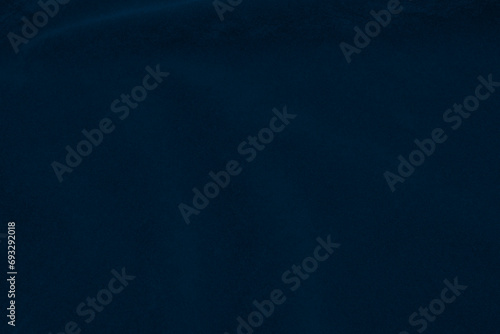 light blue corduroy fabric texture used as background. color blue fabric background of soft and smooth textile material. cloth, velvet, grooves luxury navy tone for silk.. photo