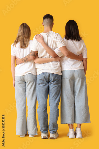 Young people in stylish jea...