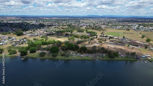 Corcoran Park And Grafton Cemetery On The Banks Of Clarence River In Grafton, NSW, Australia. aerial pullback shot photo