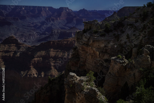 Grand Canyon, steeped in moonlight, from Mather Point looking into the depths of the canyon just before dawn.