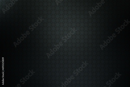 Dark background with a pattern of black and white rhombuses
