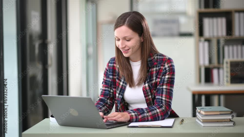 Businesswoman Analyzing Finance on Tablet and Laptop at modern Office Desk tax, report, accounting, statistics, and analytical research concept Businesswoman Analyzing Finance on Tablet and Laptop at modern Office Desk tax, report, accounting, statistics, and analytical research concept