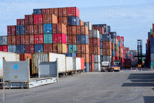 Containers piled up at the port photo