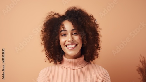 Cheerful young woman who is happy Look into the camera with a fun and charming smile.