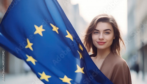 girl holds the flag of Europe on the street