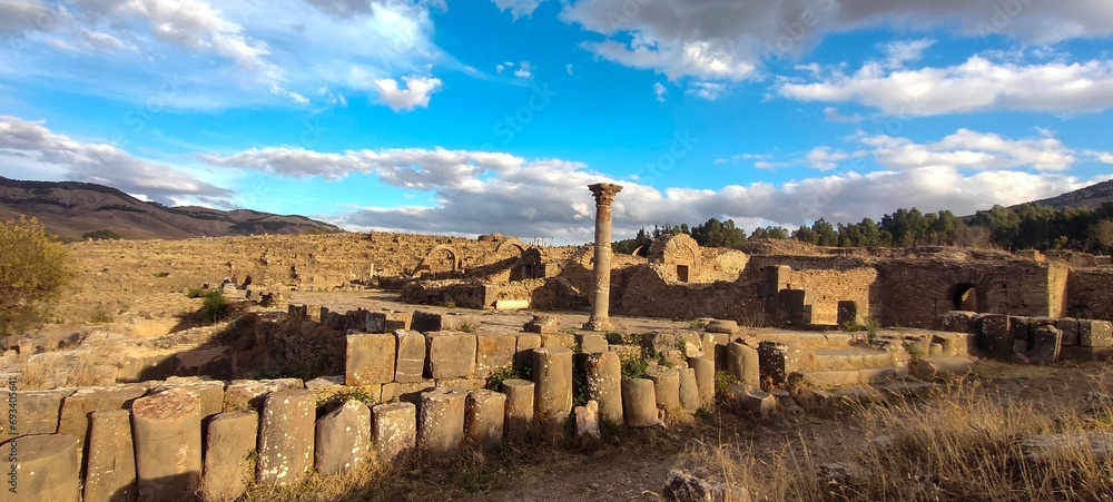 Fototapeta premium Remains of Cuicul village in Djemila town, archaeological area rich in well-preserved Berber-Roman ruins in North Africa, UNESCO World Heritage Site, Sétif, Algeria.