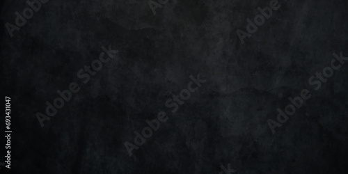 Dark black stone wall grunge backdrop texture background. monochrome slate grunge concrete wall black backdrop vintage marbled textured border background.   © armans