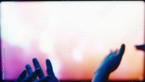 Hands of unrecognizable people on music concert. Shot with RED helium camera in 8K.   photo