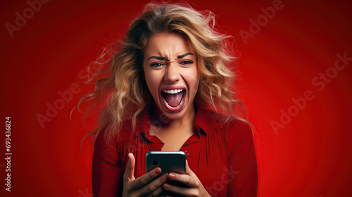 Woman Holding Cell Phone With Open Mouth