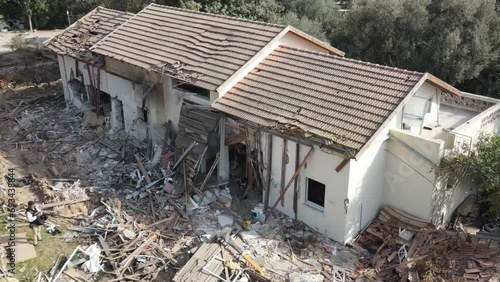 Destroyed home in kibbutz Beeri after terror attack, Israel, Aerial
The kibbutz of Bari was attacked by the Hamas terrorist organization on October 7th, drone view, December,2023
 photo