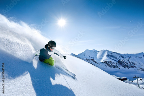 wonderful skiing in perfect powder snow condition in the Alps on a sunny day.