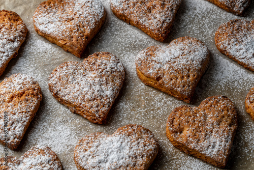 Home made heart shaped shortbread cookies on baking tray