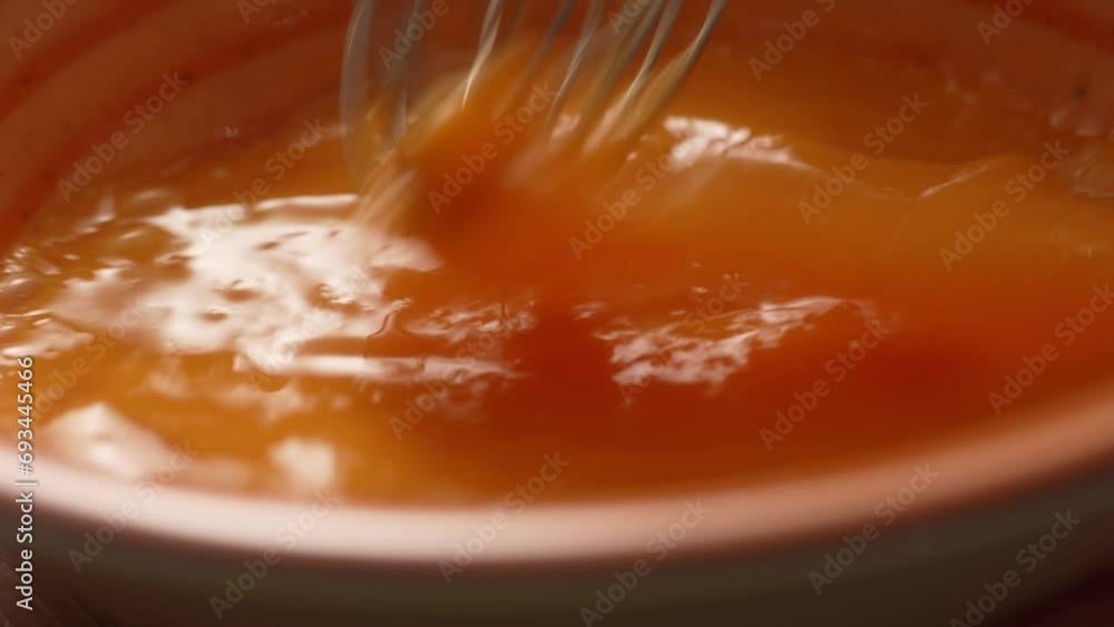 Whisking Eggs in Bowl, Meal Prep Action. Close-up, shallow dof. Whisking Eggs in Bowl, Meal Prep Action. Close-up, shallow dof.