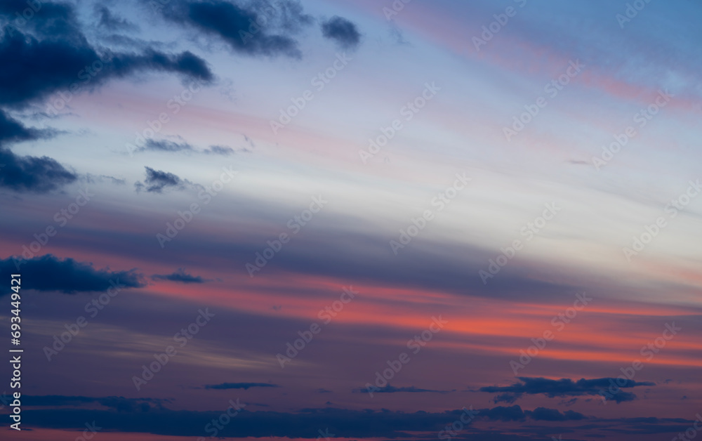Dramatic dark moody blue and pink sunset sky. Natural background Dramatic dark moody blue and pink sunset sky. Natural background