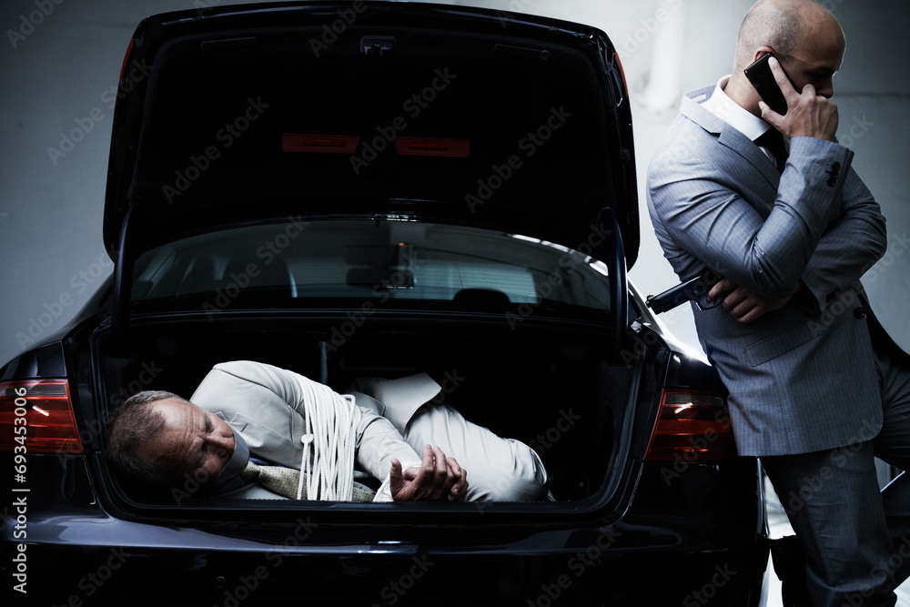 Phone call, car and man with victim in trunk for negotiation