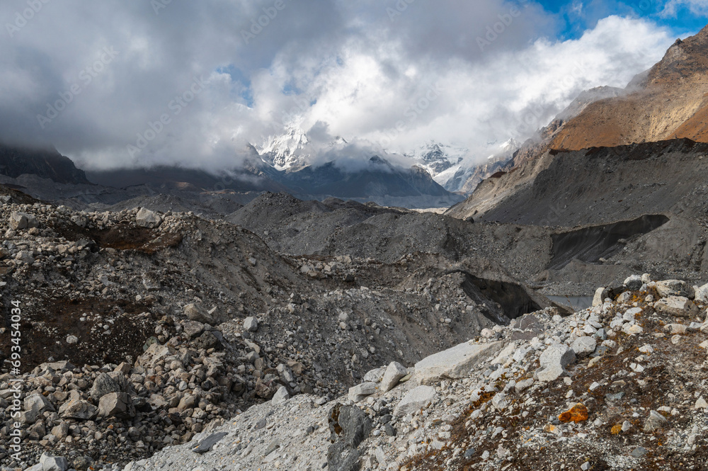 Pass through Ngozumpa glacier from Gokyo to Dzongla in Himalaya mountains during EBC Everest bace camp or Three passes trekking in Sagarmatha, Khumjung, Nepal.