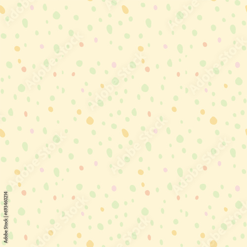 Polka dot doodle pattern with different hand drawn rounded spots isolated on yellow background. Green, red, purple, pink, violet, yellow dotted wallpaper.