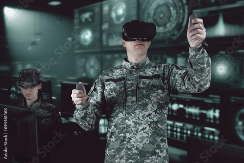 Warfare pilot using head-mounted displays VR glasses, digital device operating with robot, drone or troops of mechanical soldiers. The military's training virtual simulators, AI technology photo