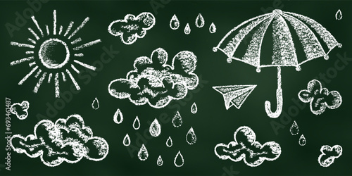 Realistic Chalk Drawn Sketch. Set of Design Elements Sun, Clouds, Rain, Drops, Umbrella, and Paper Airplane Isolated on Chalkboard Backdrop.