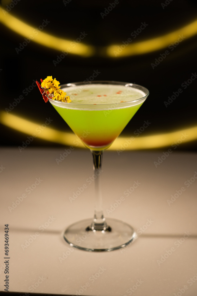 Alcoholic cocktail on a black background. Concept of cocktails and alcohol