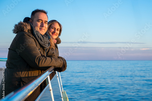 A couple on a boat watching the sunset. © Carolina Santos 