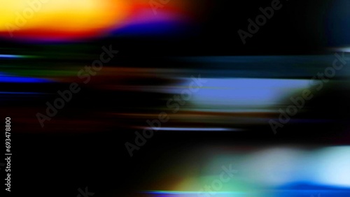 Black background with blurry color spots, blurred background 