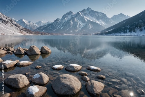 rocks lake with mountains winter