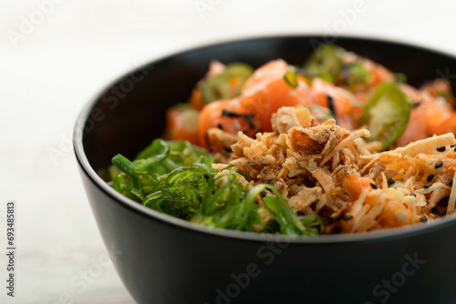 Salmon, Poké bowl in a black bowl