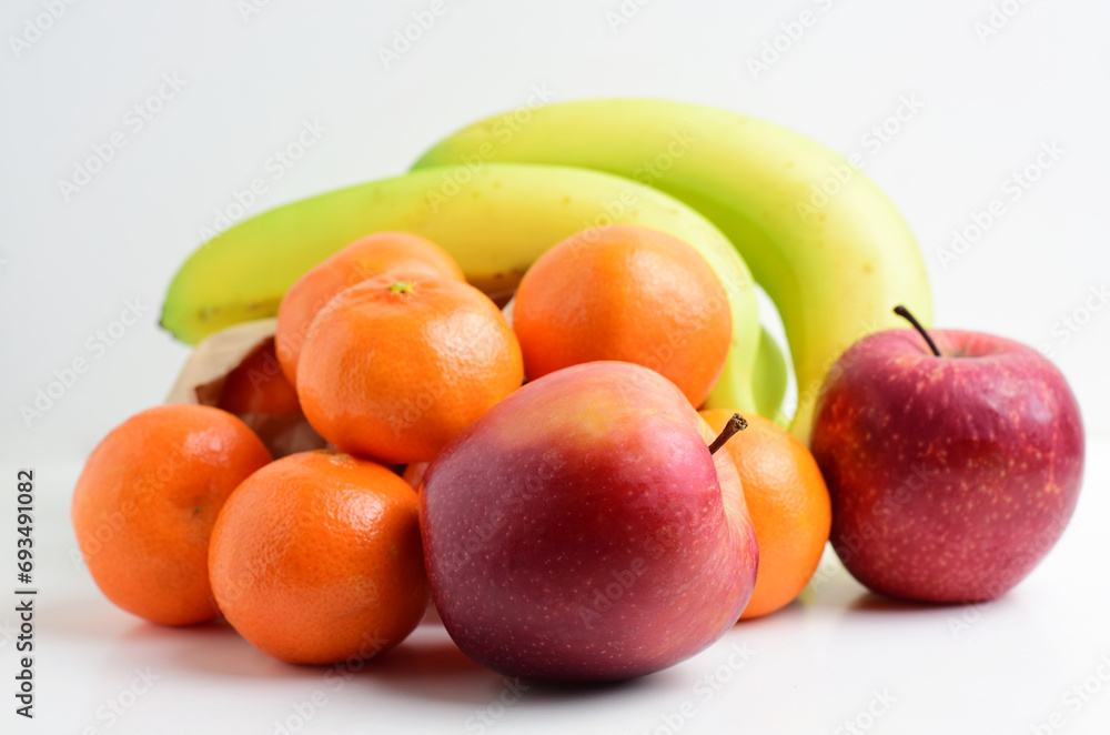 Various fruits, apples, bananas and tangerines, for a healthy life. Various fruits, apples, bananas and tangerines, for a healthy life.