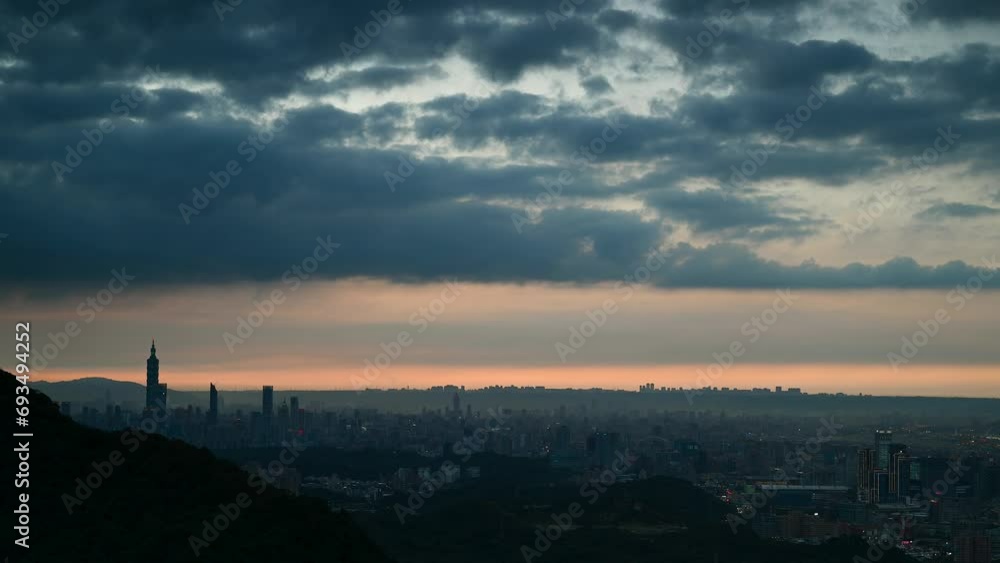 A captivating view of a city's silhouette against a dramatic sky at dusk. The fading light outlines the architectural marvels, evoking serenity. A captivating view of a city's silhouette against a dramatic sky at dusk. The fading light outlines the architectural marvels, evoking serenity.
