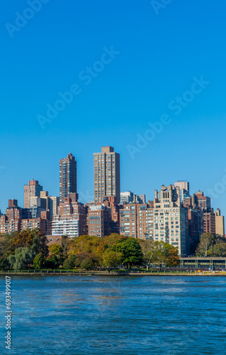 Panoramic view of buildings in central Manhattan New York seen from the East River © Jack Krier