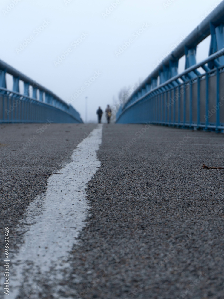 Person walking on bridge